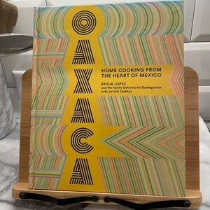 Oaxaca Home Cooking Book by Bricia Lopez & Cookbook Stand